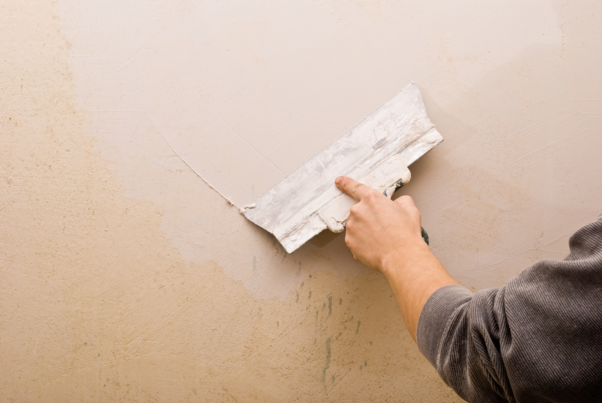 Filling walls. House repair. water damage plaster repair
